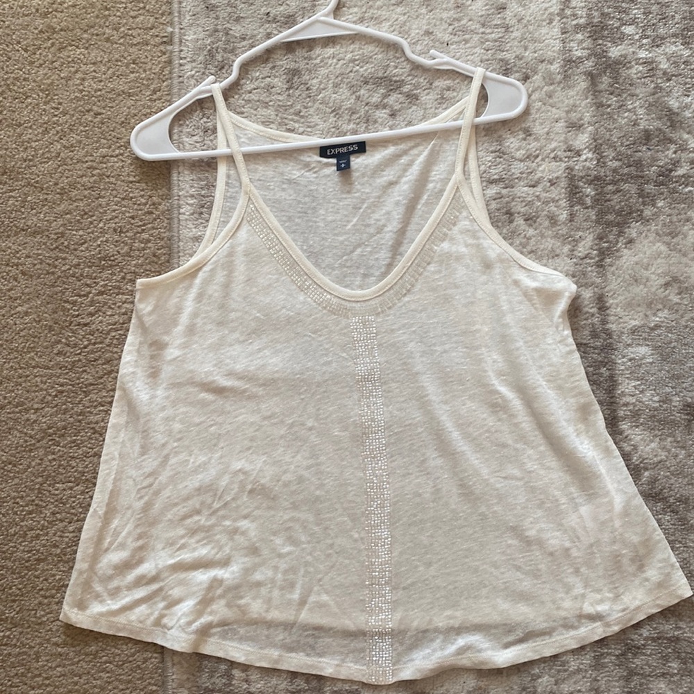 Cream sheet Express tank with beaded embellishment. Brand new, never worn.